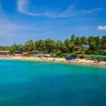 blue body of water under sunny sky in GOA, India