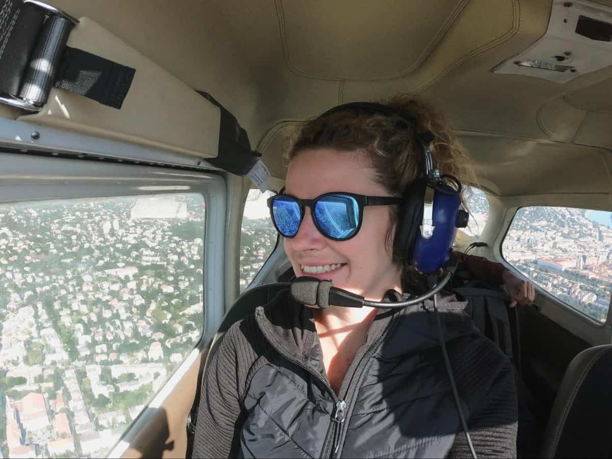 Melissa Giroux in a helicopter