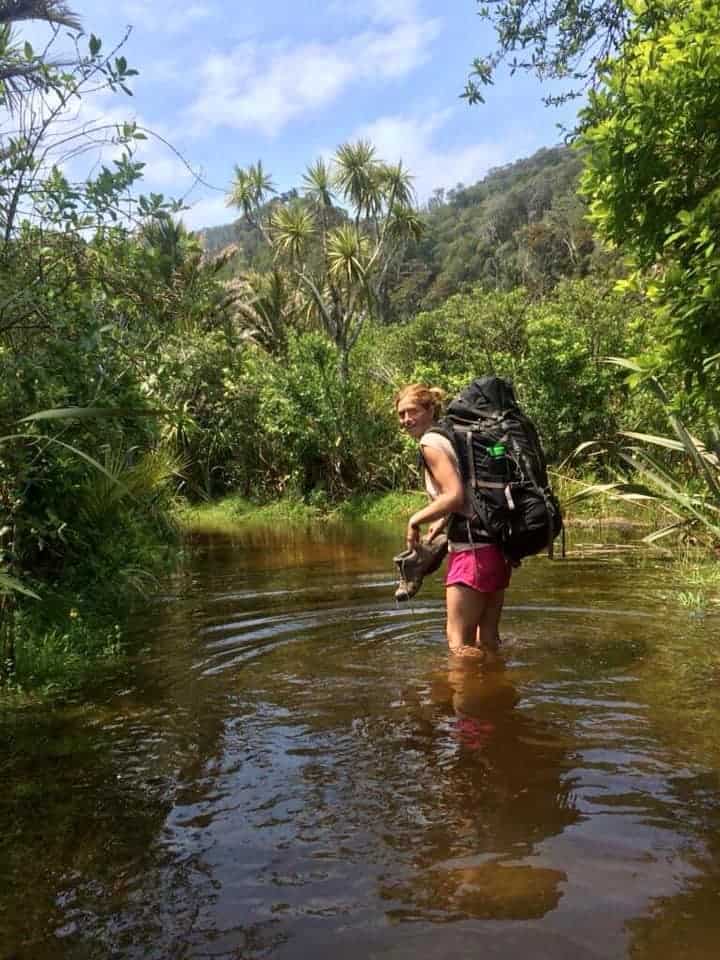 Kelly wading through some water