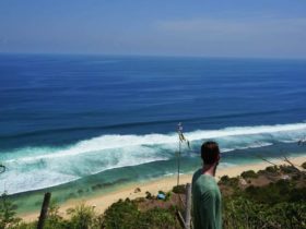 Cameron looking to the beach in Jimbaran, Bali, Indonesia