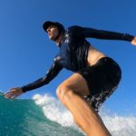 Cameron surfing during a sunny day in San José del Cabo, in Baja California, Mexico