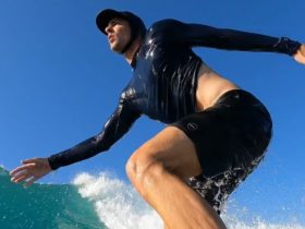 Cameron surfing during a sunny day in San José del Cabo, in Baja California, Mexico