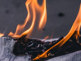 Newspaper burning on focus photography photoo