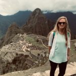 Anny Wooldridge standing in front of a part of Machu Picchu in Peru