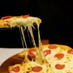 Slicing a Pepperoni Pizza