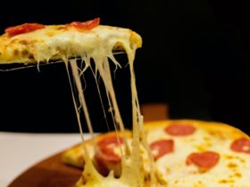 Slicing a Pepperoni Pizza