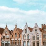 six brick buildings built very close together in ghent belgium