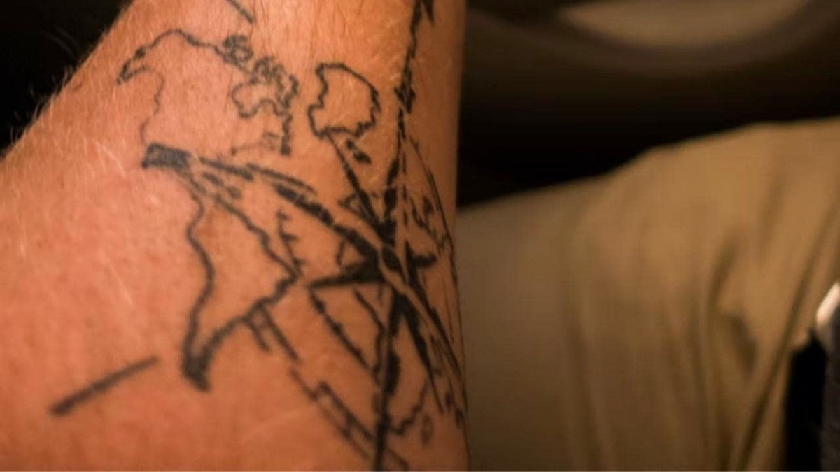 Broken Compass Tattoo