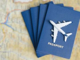 Toy airplane on top of a stack of passports